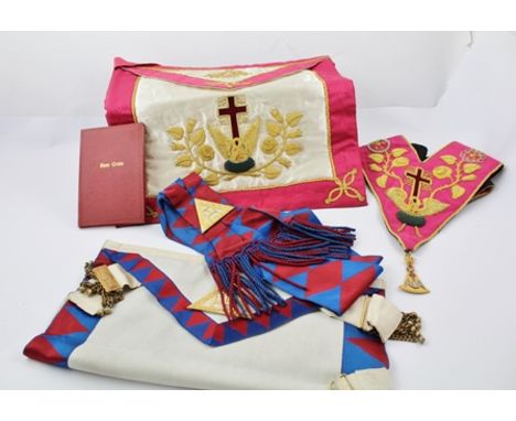A MASONIC ROSE CROIX 18 degree APRON AND COLLAR with jewel, together with a BOOK OF RITUAL, and a ROYAL ARCH APRON AND SASH 