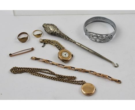 A MIXED LOT comprising a 9ct gold signet ring plus one other, a watch, a gilt metal back and front locket on chain, a bar bro