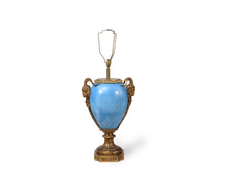 A large French blue ground ceramic and gilt metal mounted table lamp in Louis XVI style, circa 1900, the ovoid body applied w