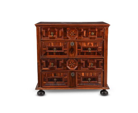A William & Mary yew wood oyster veneered and inlaid chest of drawers, circa 1690, 98cm high, 98cm wide, 55cm deepFor a chest