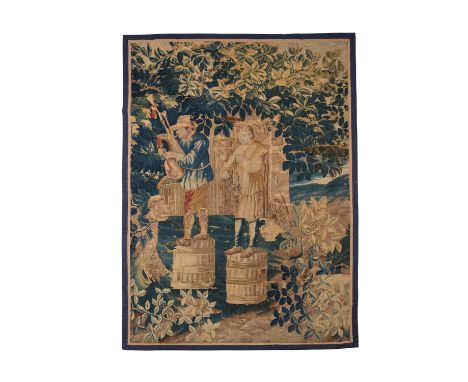 A French 'Teniers' tapestry fragment, early 18th century, possibly Aubusson, with two rustic musicians standing on barrels, o