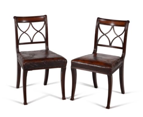 A set of six Regency mahogany dining chairs, circa 1815, each tablet moulded top rail above a twin X-shape splats, flanked by