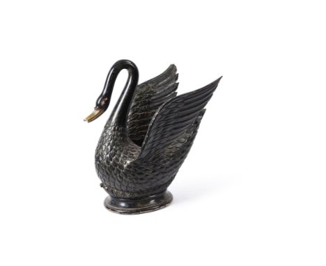 A large and unusual carved and ebonised wood model of a swan, probably previously used as a bottle cooler or planter, 20th ce