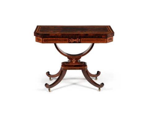 Y A Regency rosewood and satinwood banded folding card table, circa 1815, the folding top opening to a baize inset interior, 