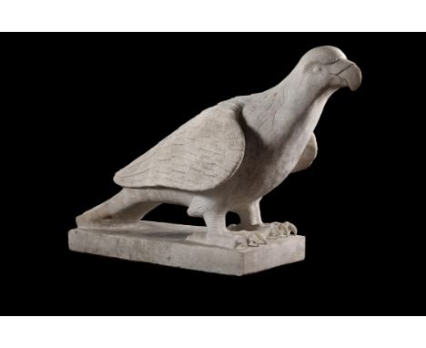 A monumental sculpted white marble model of a perched parrot or eagle, possibly Italian, with stylised features and boldly ca