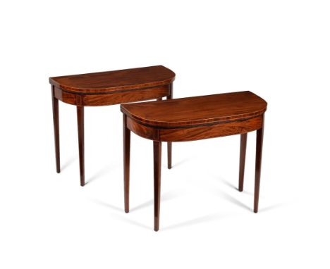 A pair of George III mahogany and line inlaid folding card tables, circa 1790, of D-shaped outline, each 74cm high, 92cm wide