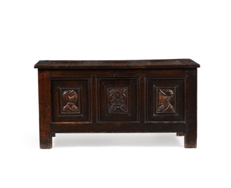 A panelled oak chest or coffer, probably first half 17th century, the front incorporating twin Romayne panels, 60cm high, 115