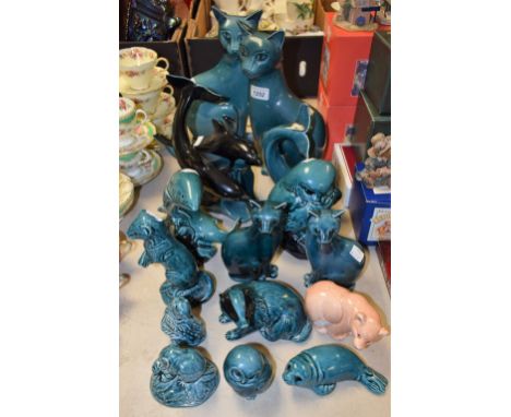 Ceramics - a Poole owl, turquoise glaze; a pair of Poole seated cats; another, similar; a Poole dolphin; etc.