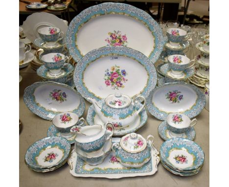 A Royal Albert Enchantment pattern part dinner and tea service comprising dinner plates, salad plates, side plates, serving d