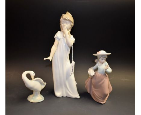 A Nao figure, of a yawning girl; another, of a flower girl; a Lladro model of a Goose (3)