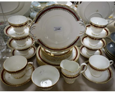 A Salisbury Sarum eight-setting tea service, comprising bread plate, salad plates, teacups, saucers and tea plates, milk and 