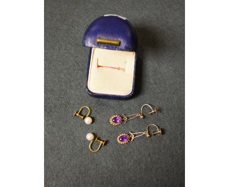A pair of 9ct gold cultured pearl earrings; a pair of amethyst set 9ct gold drop earrings 