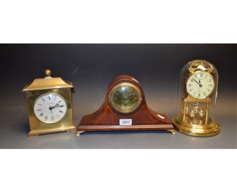 A Seth Thomas Quartzmatic mantel clock; others, Napoleon hat shape marked PHS, etc (3)