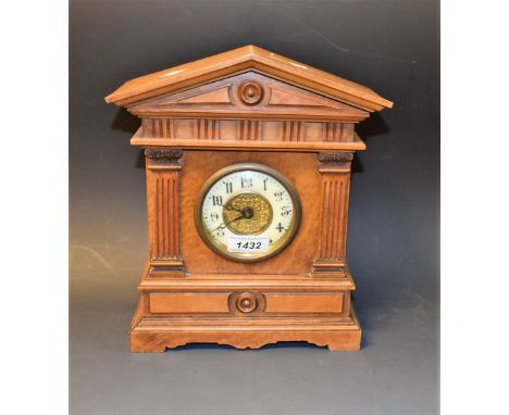 A mahogany cased mantel clock, classical pediment, Arabic numerals