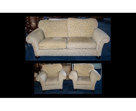 Three Piece Suite comprising a three-seater sofa and two armchairs, upholstered in a chenille fabric with pale green ground a