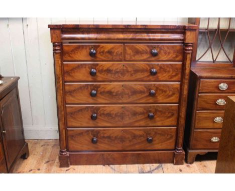 Victorian mahogany Scotch chest of seven drawers with hexagonal pillars on plinth base, 134cm high by 122cm wide by 58cm deep