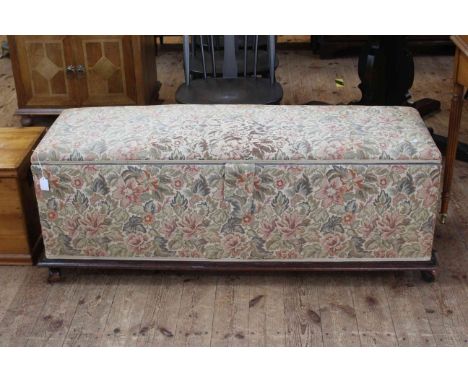 Late 19th Century ottoman in floral tapestry fabric, 50cm high by 138cm wide by 49cm deep.