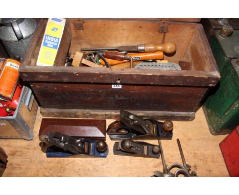Tool box containing wood planes, sharpeners and other tools (box 30cm by 62cm by 28cm).