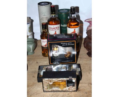 Speyside single malt Scotch whisky 70cl, two litre and a 350ml of Famous Grouse, 350ml Glenfiddich and three miniature whisky