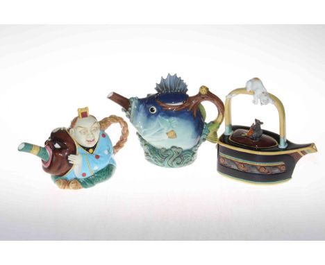 Three Minton novelty limited edition teapots including cat and mouse, Chinaman and fish teapot, one with box.