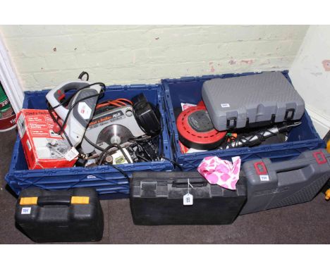 Collection of power tools including saws, drills, sanders, etc.