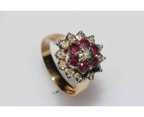 Ruby and diamond cluster 9 carat gold ring, size P.
