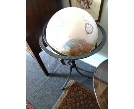 A World Globe in a Metal Frame.