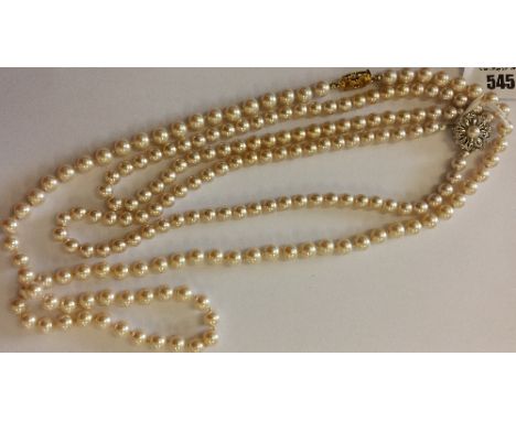 A Monet Pearl Necklace and a Pearl Strand Necklace. (a/f)