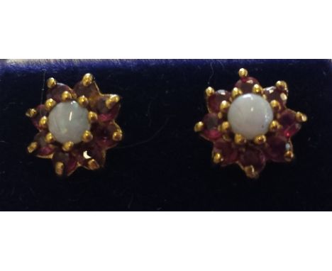 A Pair of Gold, Opal and Ruby Cluster Earnings.