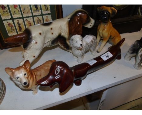 A Quantity of Ceramic Dogs.
