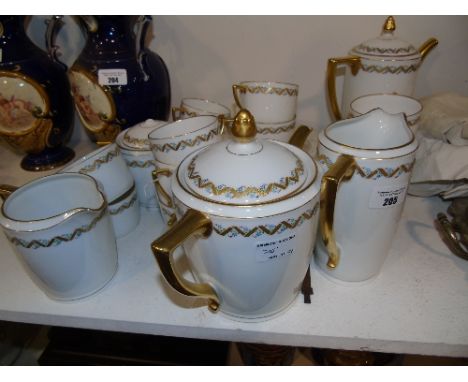 A Twelve Setting Porcelain Tea and Coffee Service decorated with a band of floral and gilt designs.