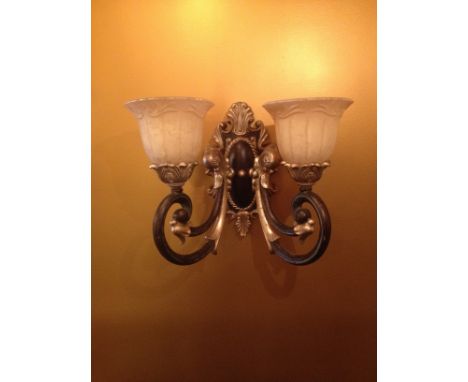 *A 'Savoy House' Two-Light Wall Sconce with Antique Finish.