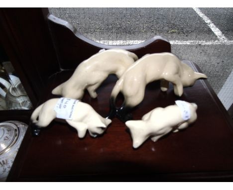 Four Ceramic Siamese Cats.