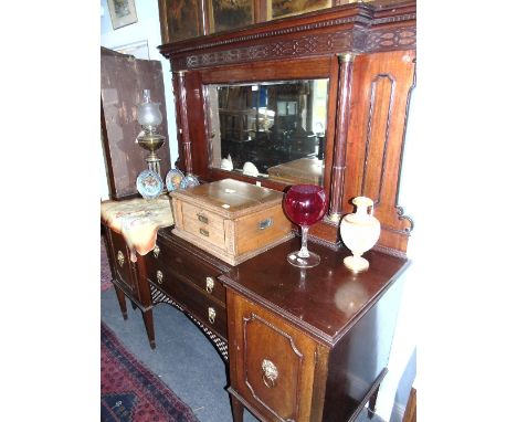 A Late 19th/Early 20th Century Brass Oil Lamp raised on three reeded columns and circular plinth.