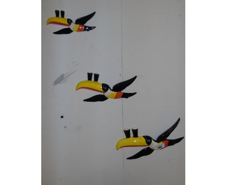 Three Carltonware Flying Toucan Guinness Ornaments.
