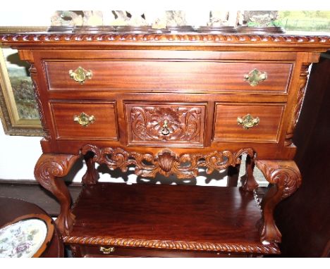 A Pair of Mahogany and Carved Side Tables of Miniature Proportions, 20th Century, the rectangular tops with rope edge, drawer