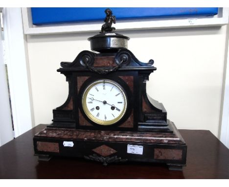 A 19th Century Slate and Marble Mantel Clock inscribed 'Rowell, Oxford' inlaid with burgandy marble and with presentation pla