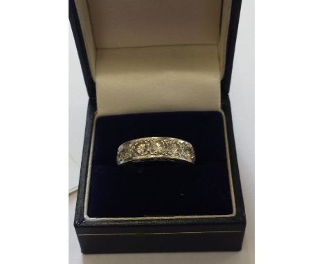 An 18ct Gold & Diamond Half-Circle Eternity Ring, the graduated brilliant-cut diamonds to the tapered band, having an estimat