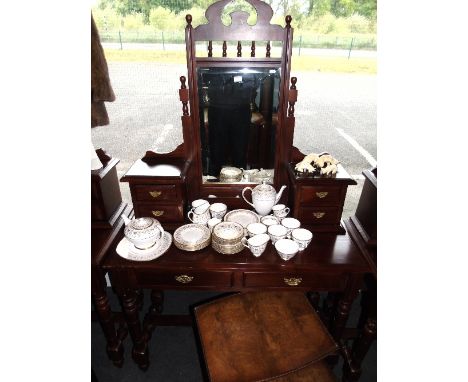 A Mahogany Dressing Table, 20th Century, with bevelled mirror flanked either side by two trinket drawers with brass handles, 