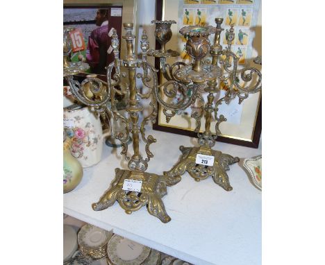 A Pair of Cast Brass Candlestick Holders.