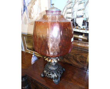 A Brass and Amber Glass Lamp