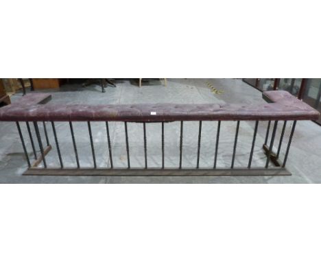 A 19th century wrought iron inglenook club fender with buttoned red leather top. 98' wide