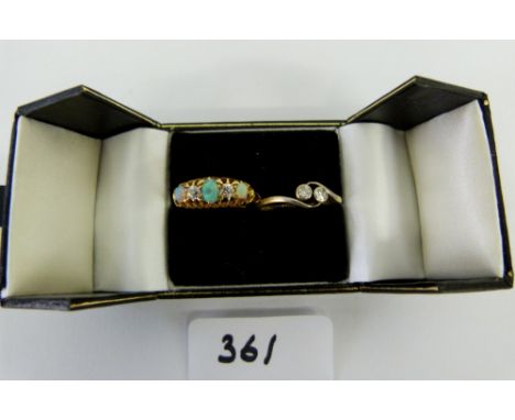 An 18ct two stone diamond crossover ring, together with a five stone opal and diamond ring in gold, marks rubbed. 4g gross