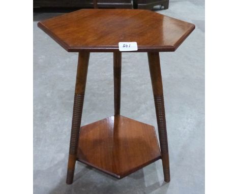 An early 20th century hexagonal two tier occasional table on splayed ring turned legs. 20½' high