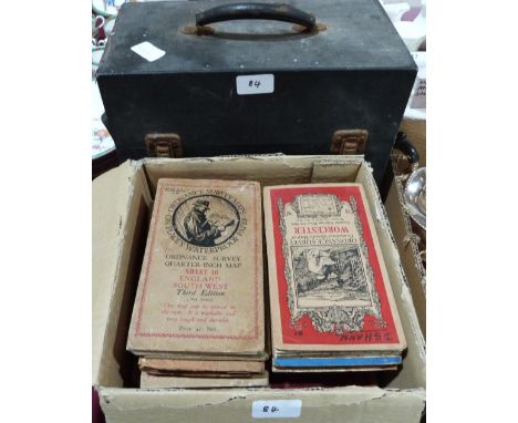 A box of 1920s-30s Ordnance Survey maps and a box of 78rpm records