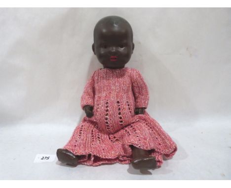 Antique porcelain deals black baby doll