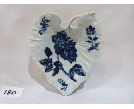 A rare Worcester leaf form dish c.1760, painted in the Blown Rose Leaf Tray pattern. 5½' long. Loss to end of stalk