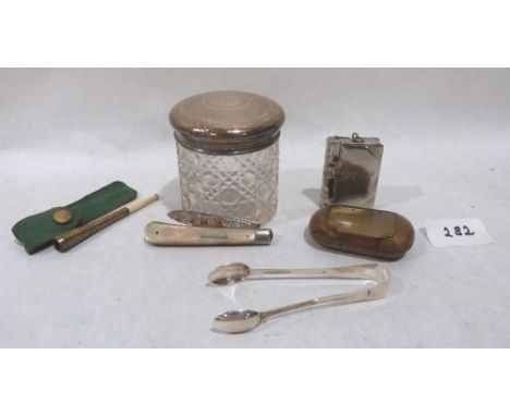 A mother-of-pearl fruit knife with silver blade; a stamp case; a silver sugar bow; a pressed horn snuffbox; a silver topped j