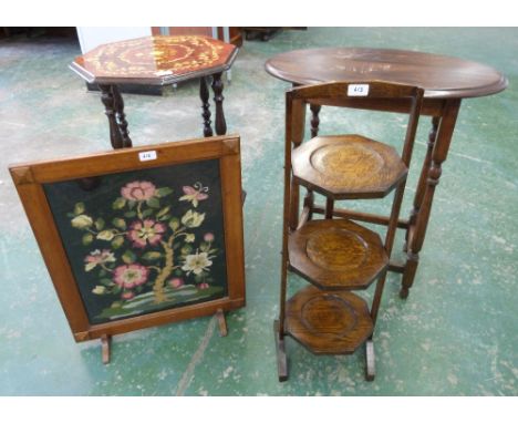 An oak folding cakestand; an oak oval occasional table; a tapestry firescreen and an inlaid etagére (4)