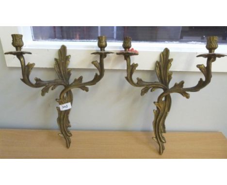 A pair of rococo revival two light wall appliques of recent manufacture. 15½' high